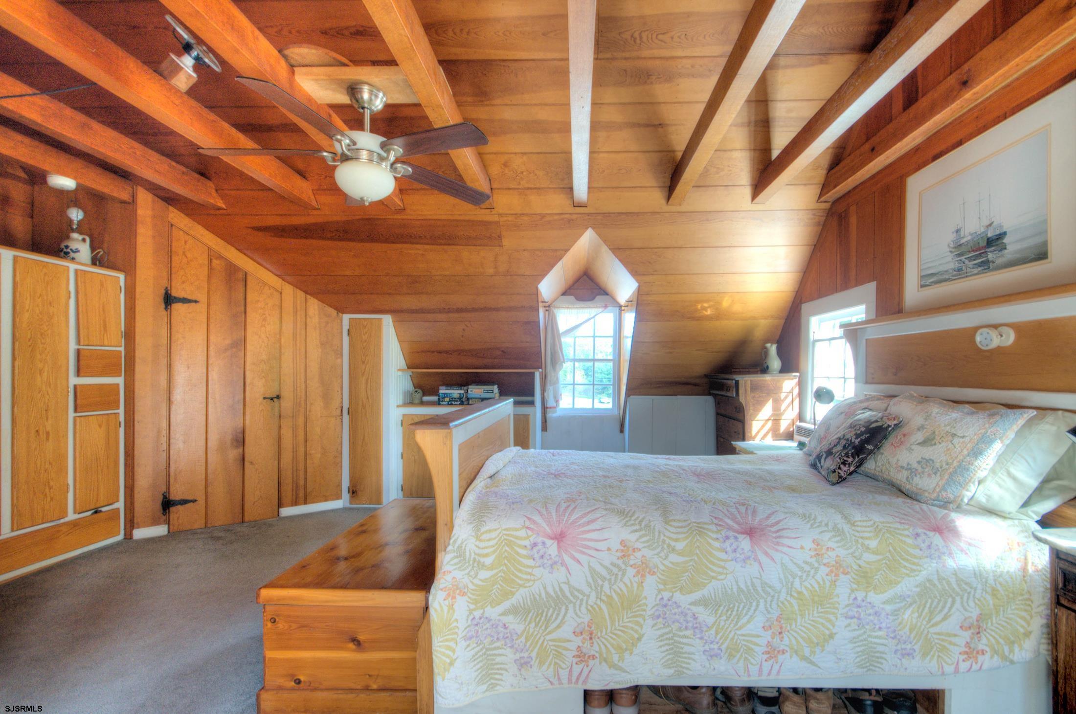 115 Rte 50 Woodbine, NJ 08270 - Photo 43 of 56 a bed sitting in a bedroom next to a window