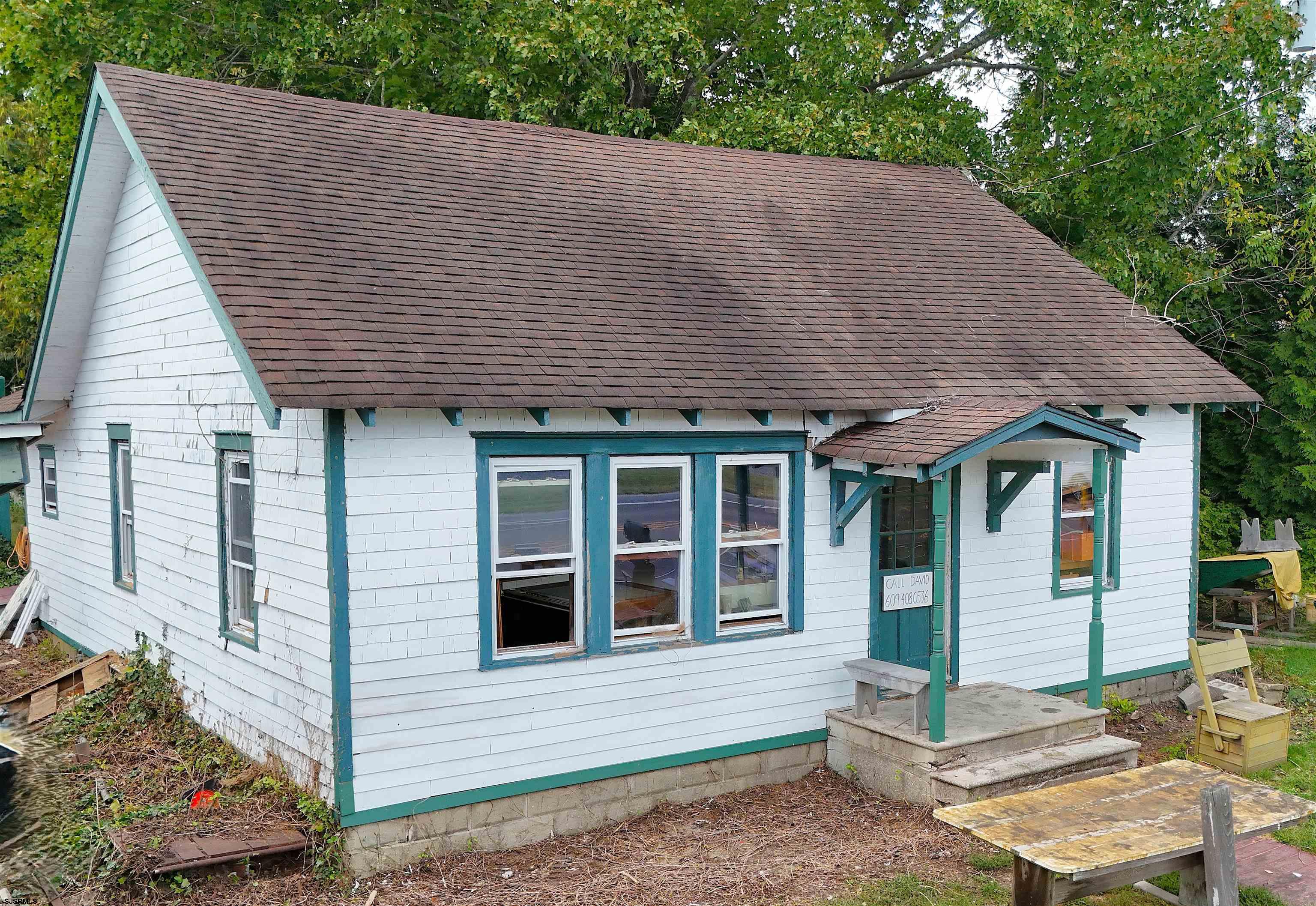 115 Rte 50 Woodbine, NJ 08270 - Photo 52 of 56 a front view of a house with a yard