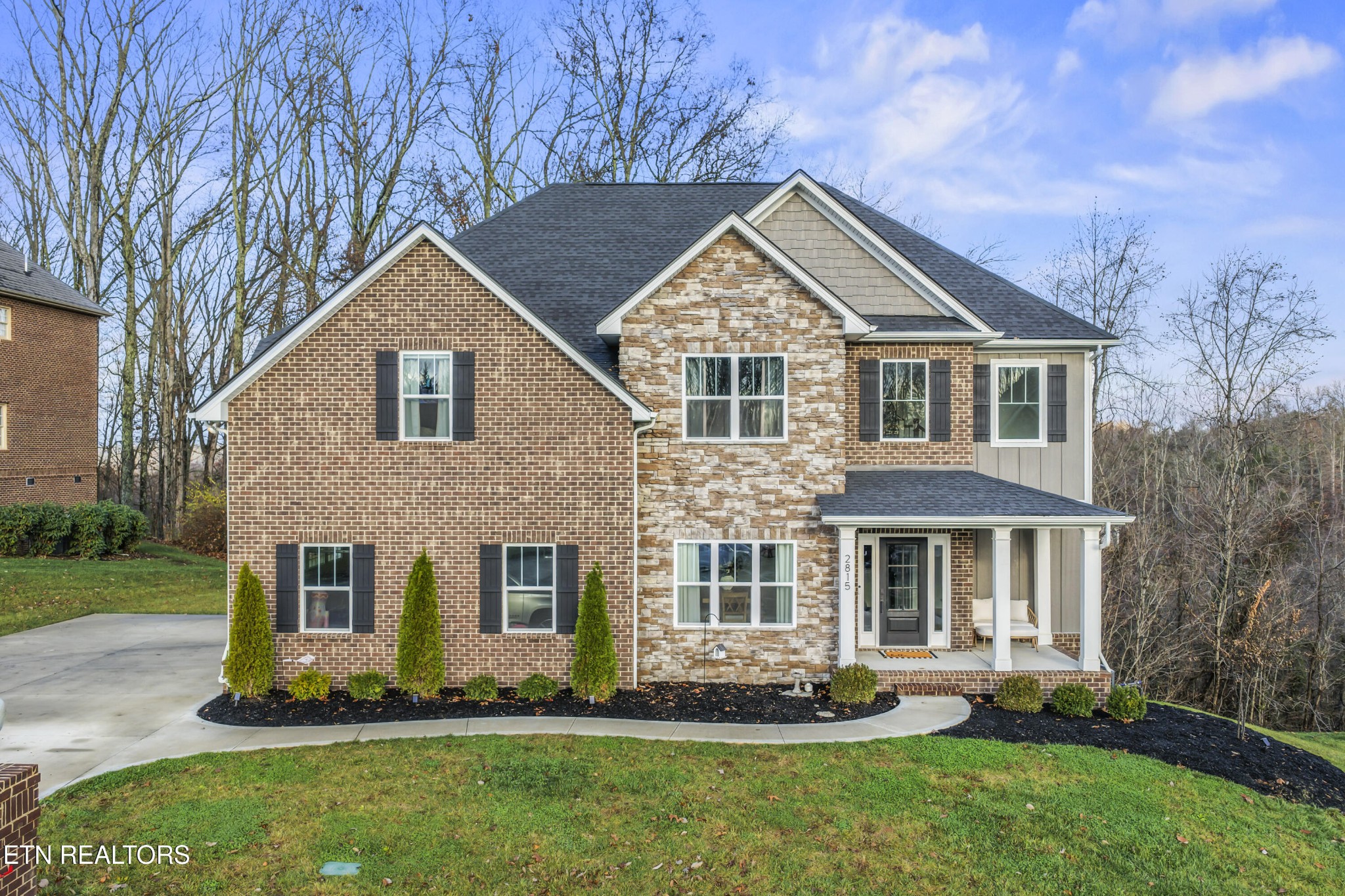 2815 Green Summers Road Knoxville, TN 37938 - Photo 2 of 50 a front view of a house with a yard