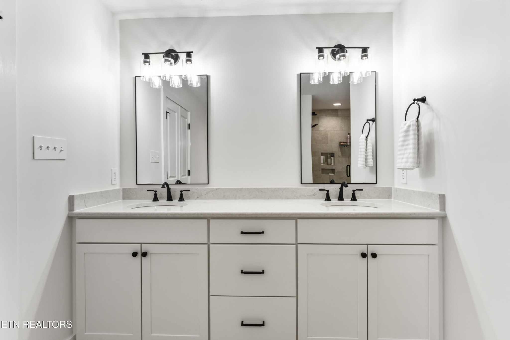 2815 Green Summers Road Knoxville, TN 37938 - Photo 24 of 50 a bathroom with double vanity sinks and a mirror