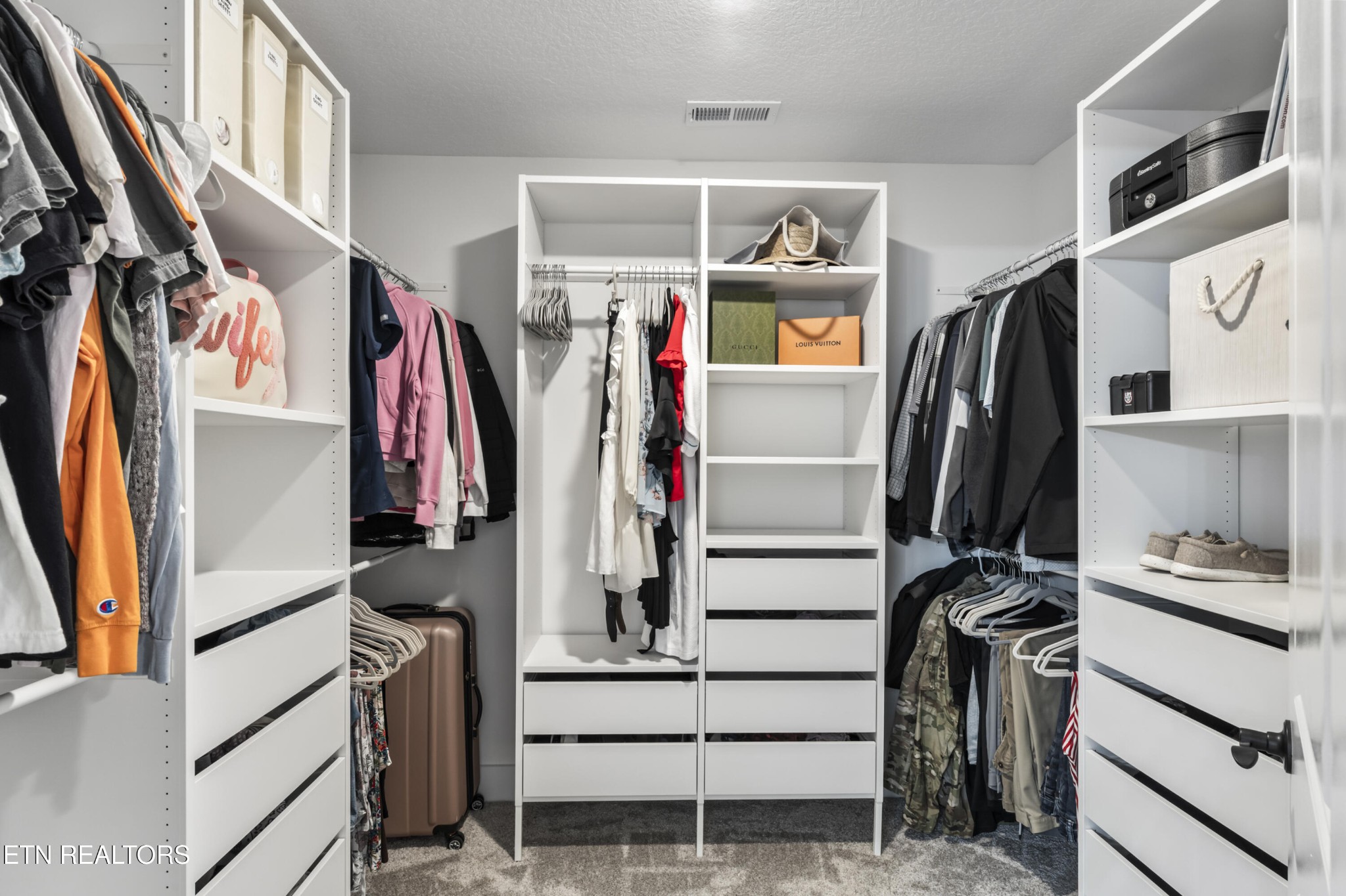 2815 Green Summers Road Knoxville, TN 37938 - Photo 26 of 50 a view of walk in closet with clothes and shoes