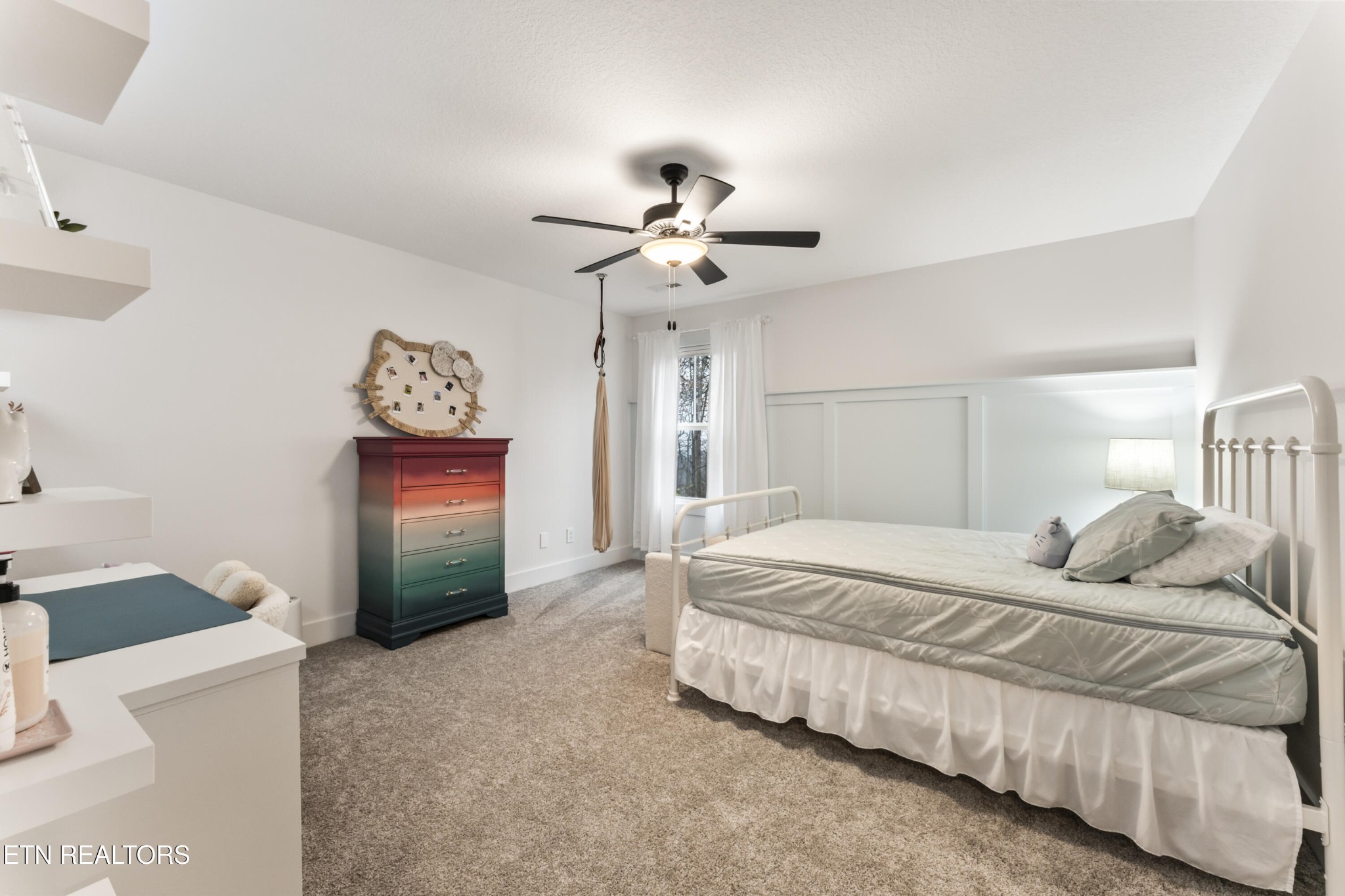 2815 Green Summers Road Knoxville, TN 37938 - Photo 28 of 50 a spacious bedroom with a bed and a chandelier