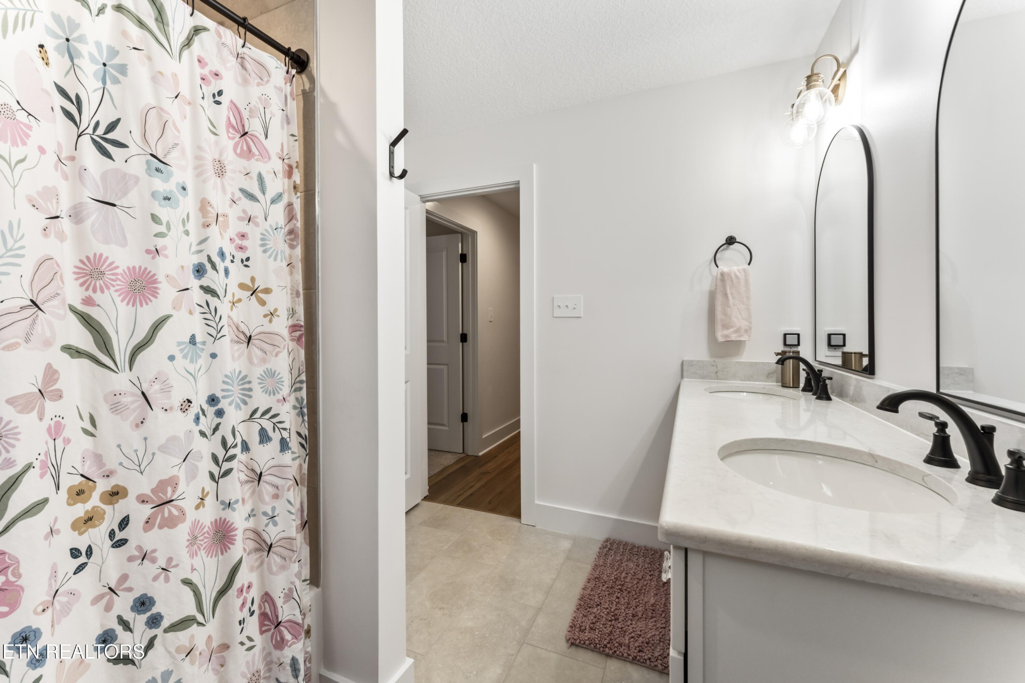 2815 Green Summers Road Knoxville, TN 37938 - Photo 31 of 50 a bathroom with a sink and a mirror
