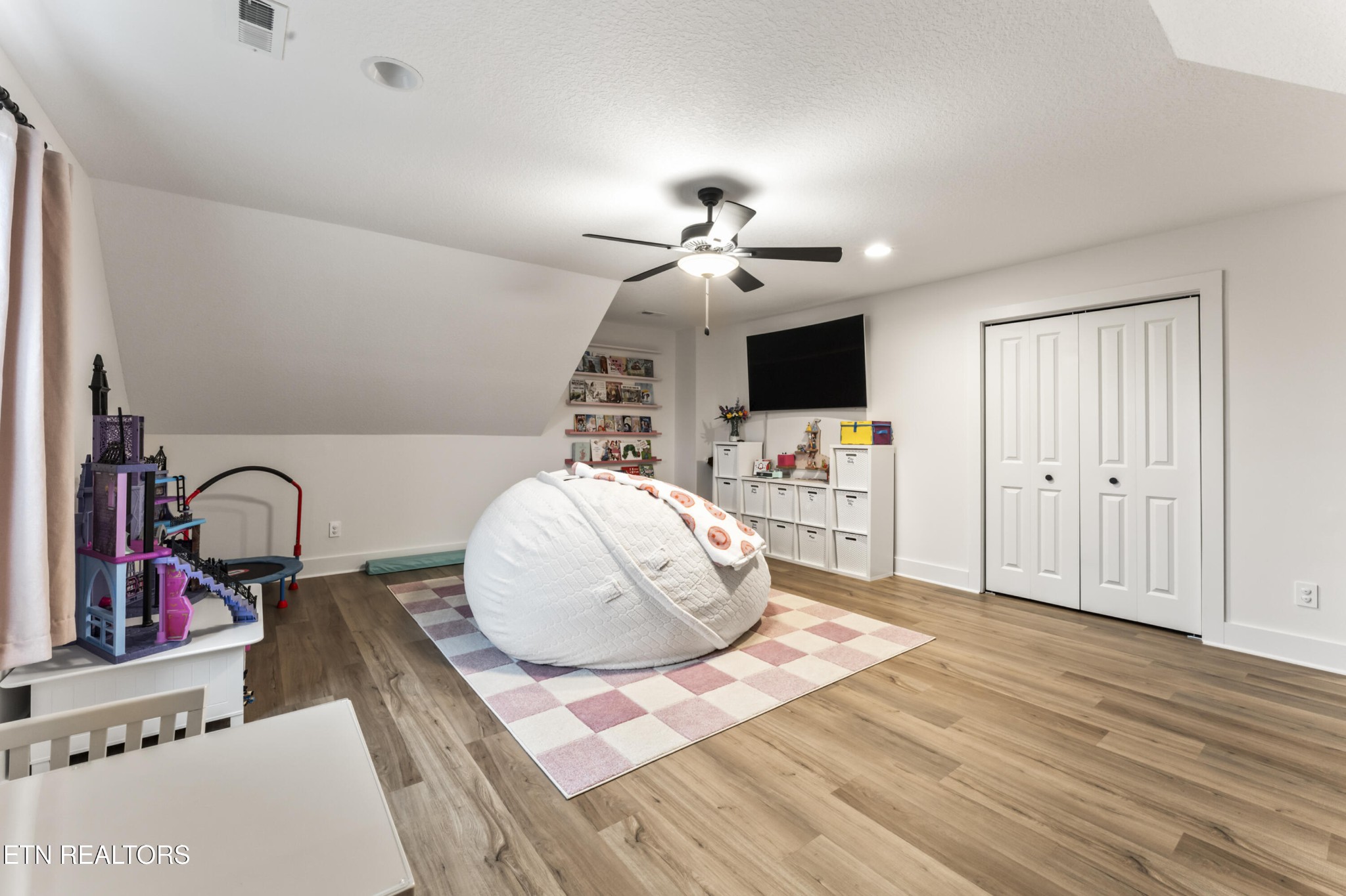 2815 Green Summers Road Knoxville, TN 37938 - Photo 33 of 50 a bedroom with a bed and a a chandelier