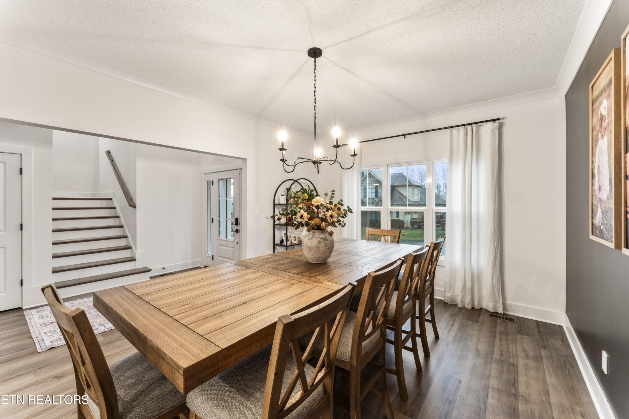 2815 Green Summers Road Knoxville, TN 37938 - Photo 7 of 50 a dining room with furniture and wooden floor