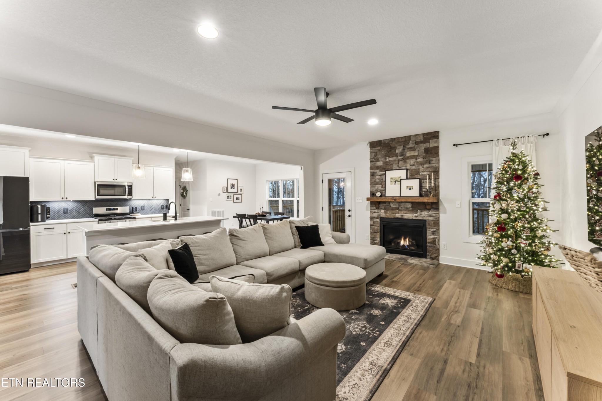 2815 Green Summers Road Knoxville, TN 37938 - Photo 9 of 50 a living room with furniture and a fireplace