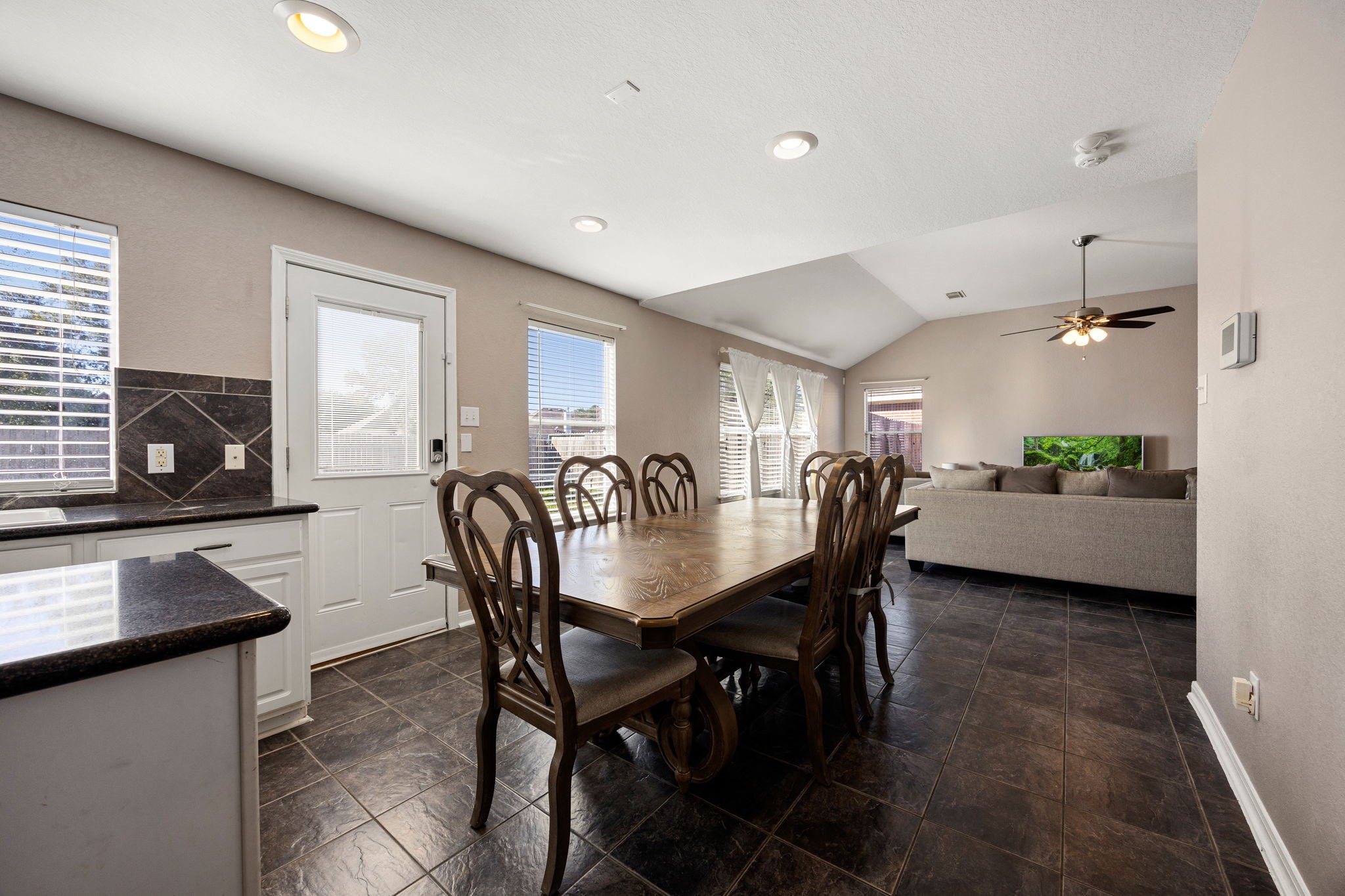 25515 Twister Trail Spring, TX 77373 - Photo 12 of 33 This inviting space features a spacious dining room seamlessly connected to both the kitchen and living area, perfect for family gatherings and everyday living.