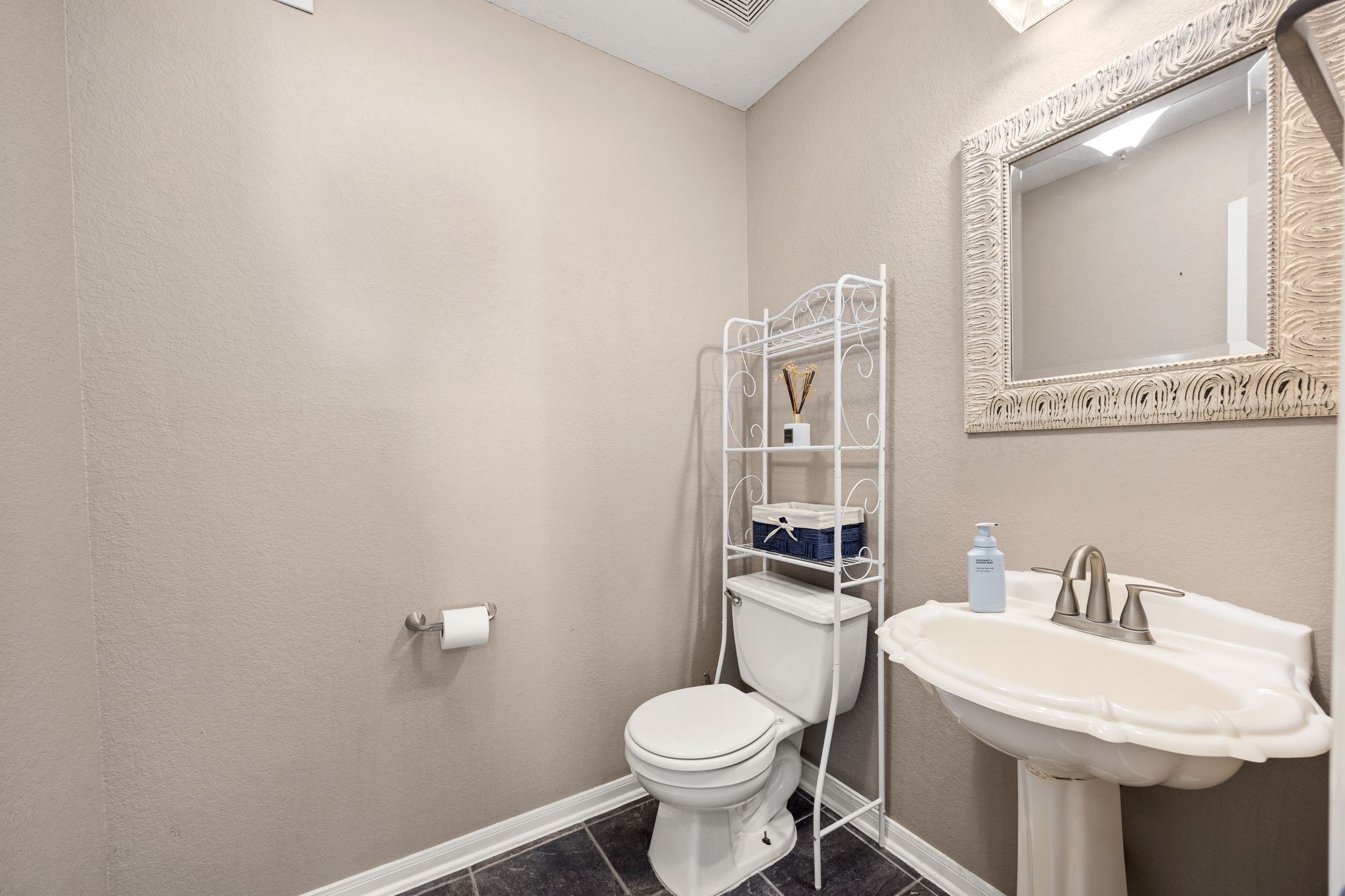 25515 Twister Trail Spring, TX 77373 - Photo 17 of 33 Half bathroom located downstairs.