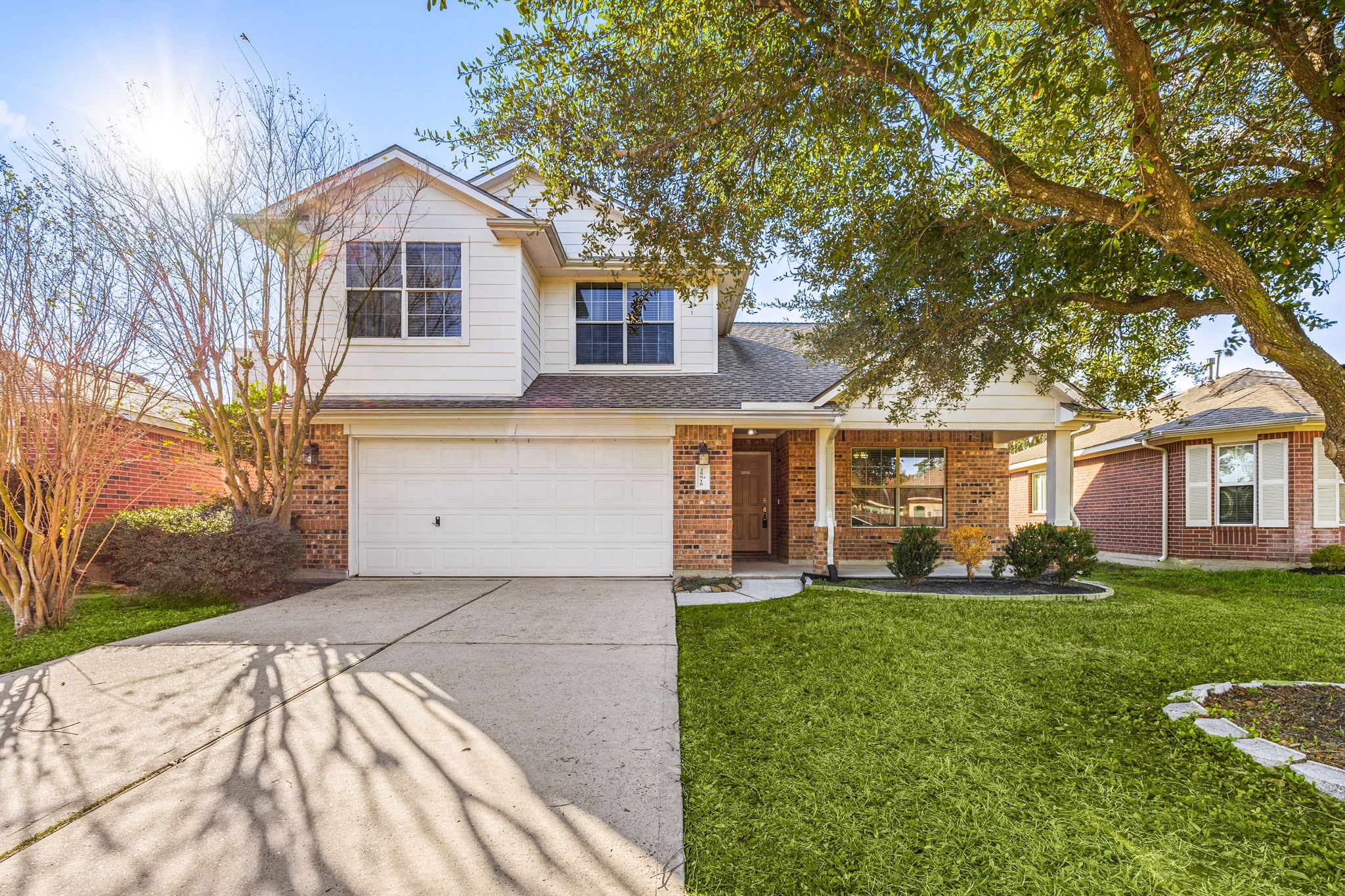 25515 Twister Trail Spring, TX 77373 - Photo 2 of 33 This charming two-story home features a brick and siding facade, a two-car garage, and a welcoming front porch. The well-maintained lawn and mature trees provide excellent curb appeal in a peaceful neighborhood setting.