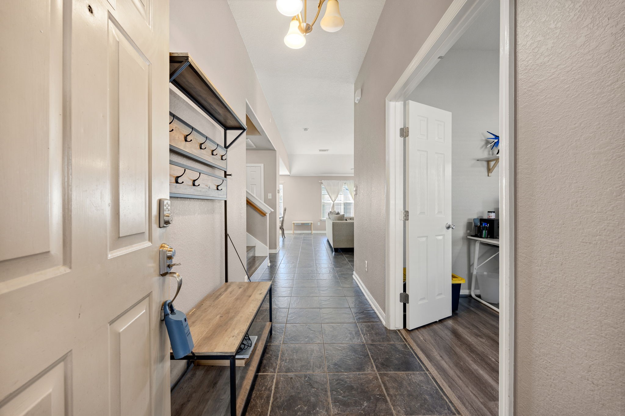 25515 Twister Trail Spring, TX 77373 - Photo 7 of 33 Welcome home to a bright and inviting entryway, large enough to accommodate a stylish mud bench for your convenience.