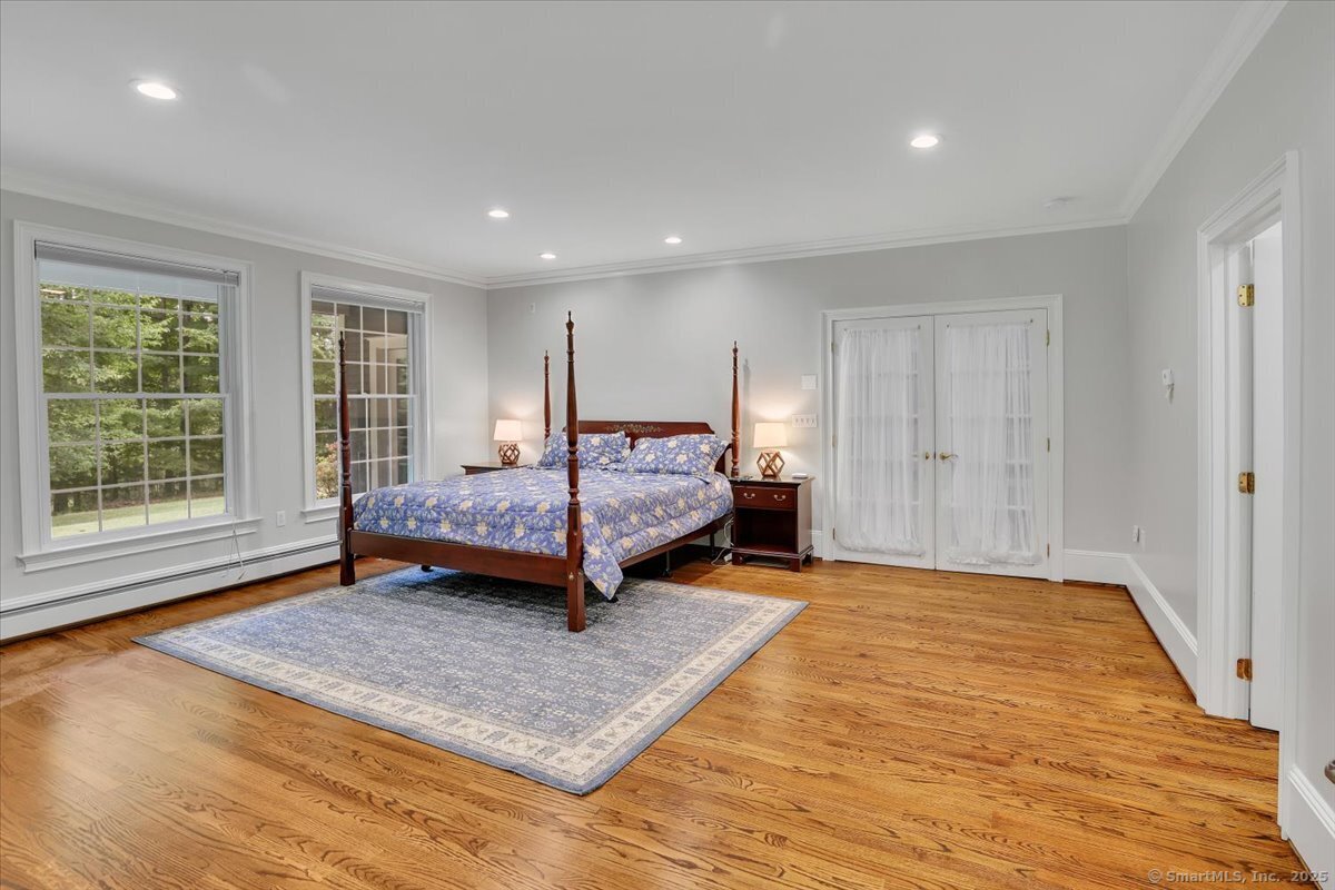 152 Cheney Lane Coventry, CT 06238 - Photo 14 of 45 a bedroom with a bed and window