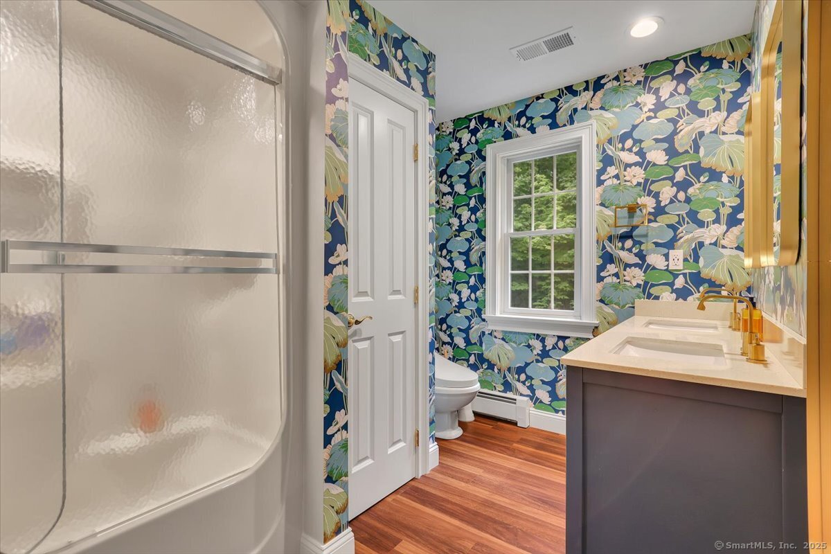 152 Cheney Lane Coventry, CT 06238 - Photo 19 of 45 a bathroom with a sink and a bathtub