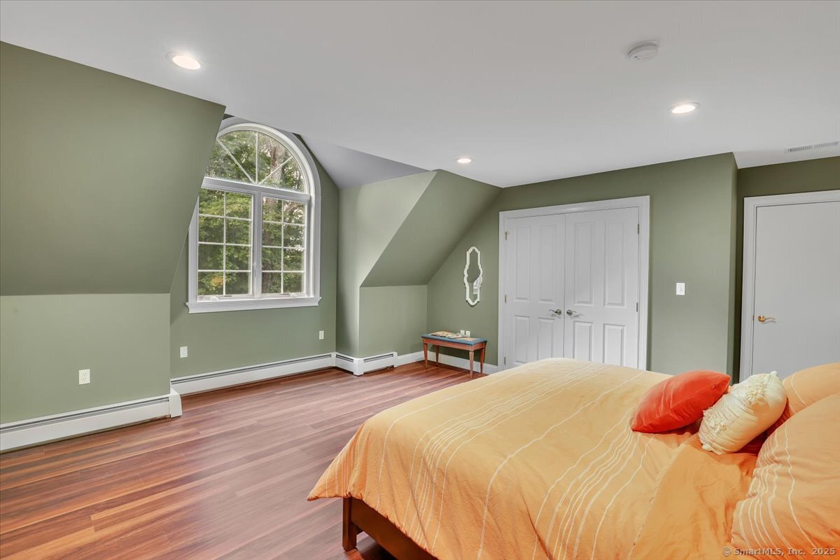 152 Cheney Lane Coventry, CT 06238 - Photo 22 of 39 a bedroom with a bed and a window