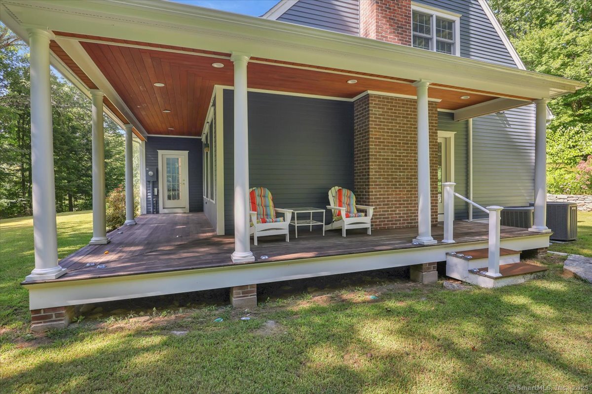 152 Cheney Lane Coventry, CT 06238 - Photo 23 of 45 a view of a backyard with a swimming pool