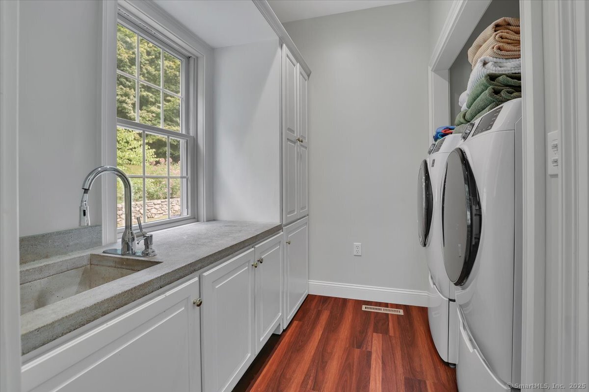 152 Cheney Lane Coventry, CT 06238 - Photo 24 of 49 Laundry room. This room is located off of the kitchen and can be used as Butler's Pantry too!