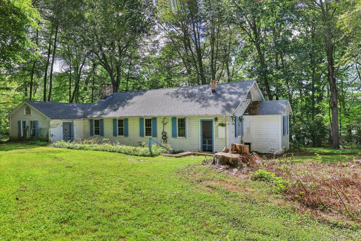 152 Cheney Lane Coventry, CT 06238 - Photo 32 of 39 a front view of a house with garden