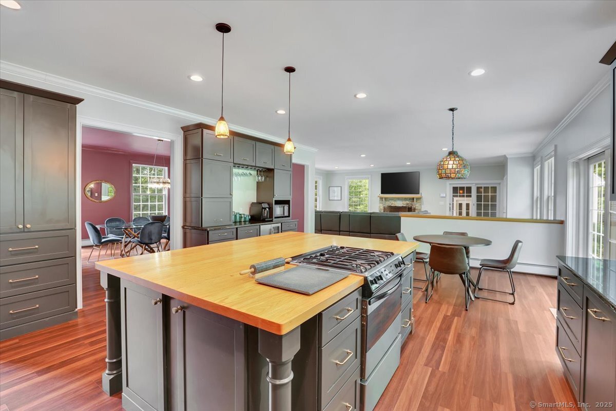 152 Cheney Lane Coventry, CT 06238 - Photo 44 of 45 a large kitchen with kitchen island a island in the center