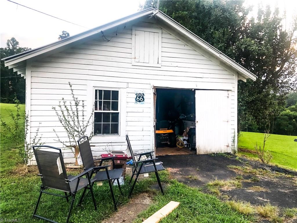 6540 Westfield Road Westfield, NC 27053 - Photo 28 of 29 20x20 work shop with lean-to off the back.