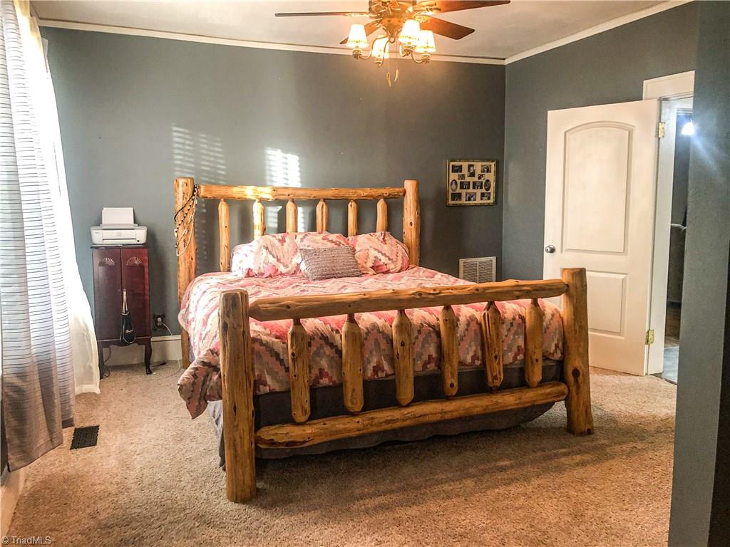 6540 Westfield Road Westfield, NC 27053 - Photo 10 of 29 Master Bedroom is full of extra spaces.