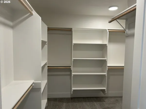 a view of an empty walk in closet