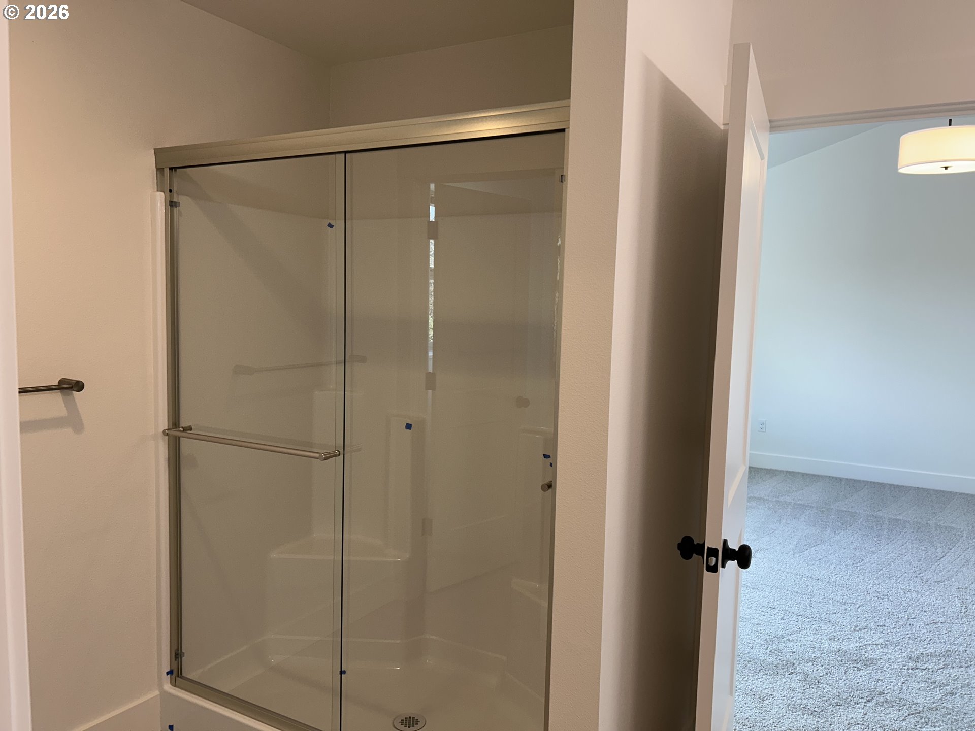 1141 Rachel Lane Molalla, OR 97038 - Photo 17 of 21 a bathroom with a glass shower door