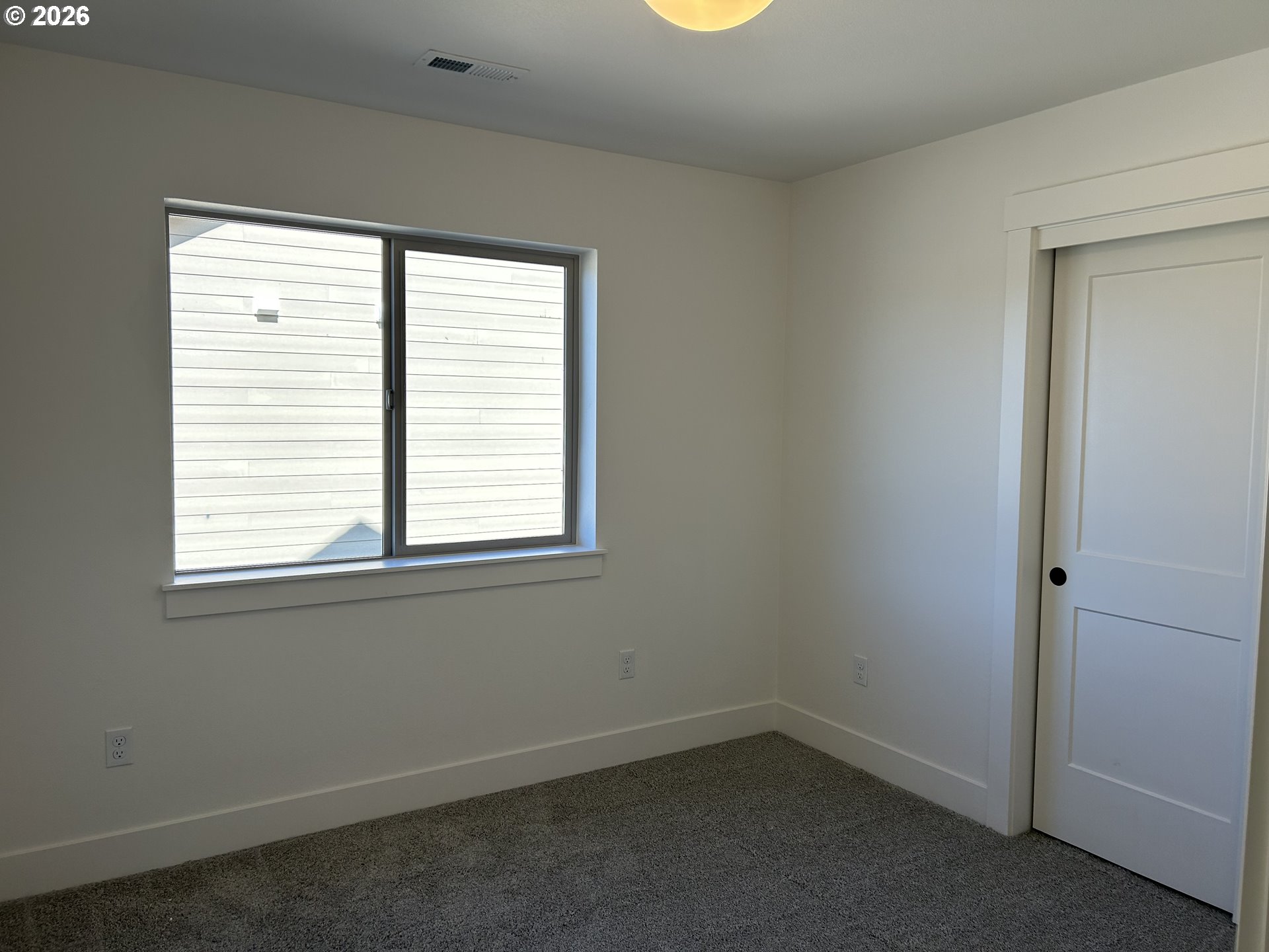 1141 Rachel Lane Molalla, OR 97038 - Photo 21 of 21 an empty room with a window
