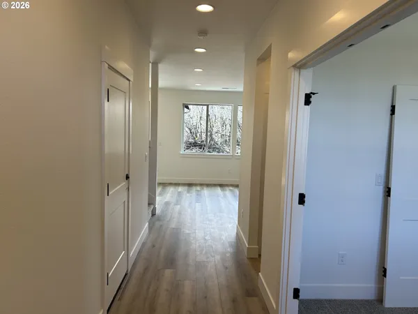 a view of entryway with wooden floor