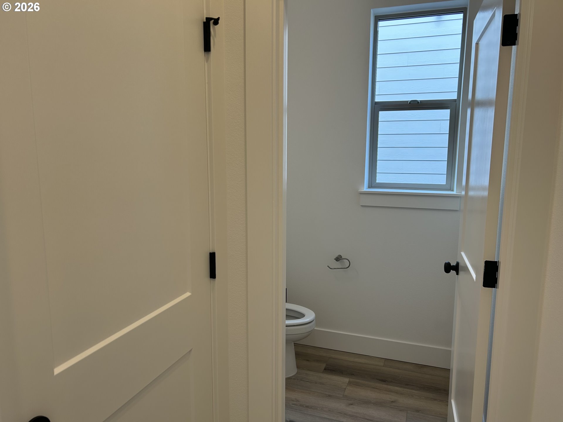 1141 Rachel Lane Molalla, OR 97038 - Photo 6 of 21 a bathroom with a granite countertop white toilet and a shower