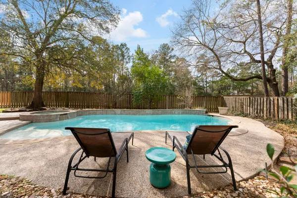 a view of a yard with furniture