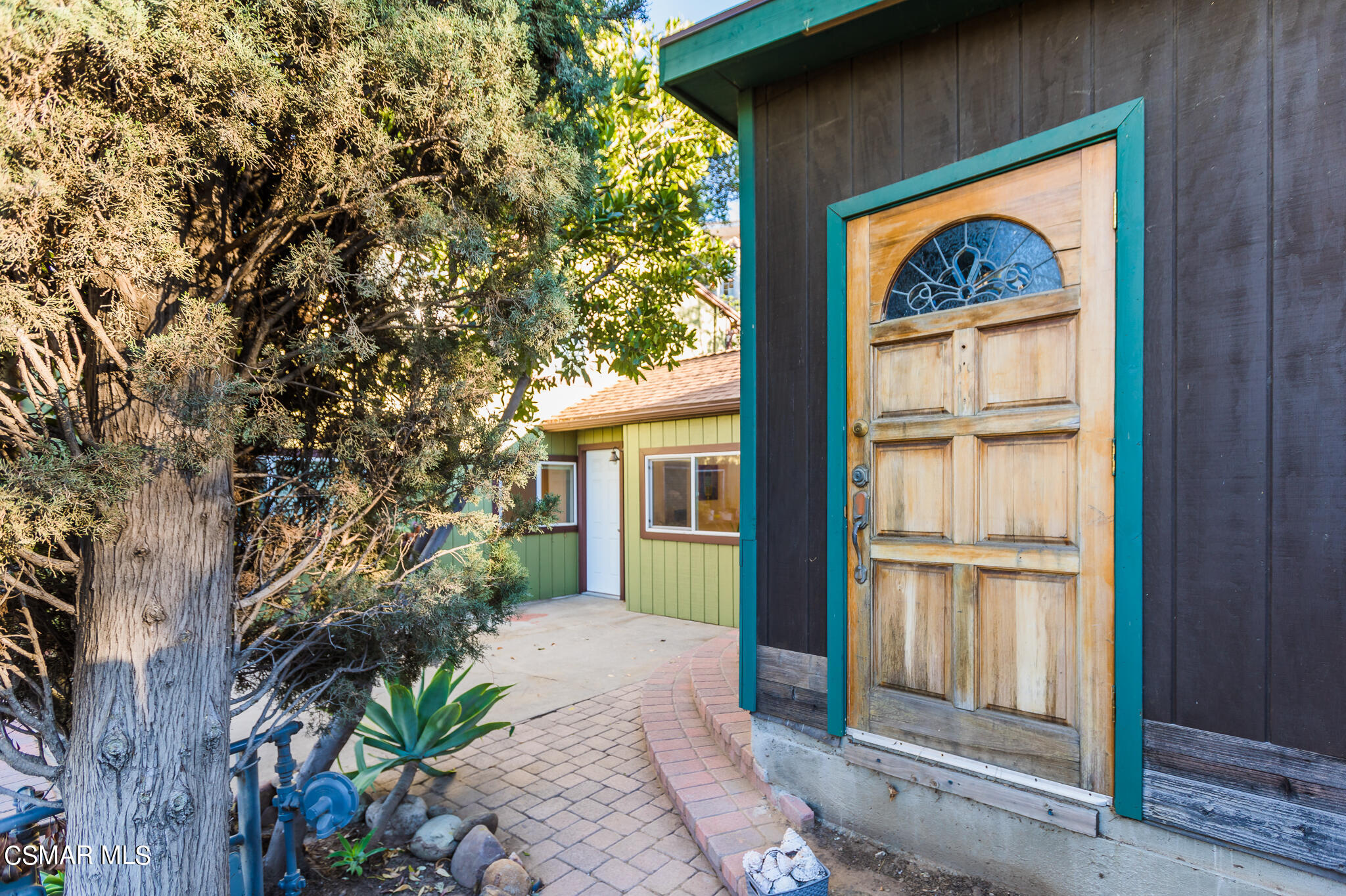 6695 Clear Springs Road Simi Valley, CA 93063 - Photo 21 of 94 a front view of a house with a yard