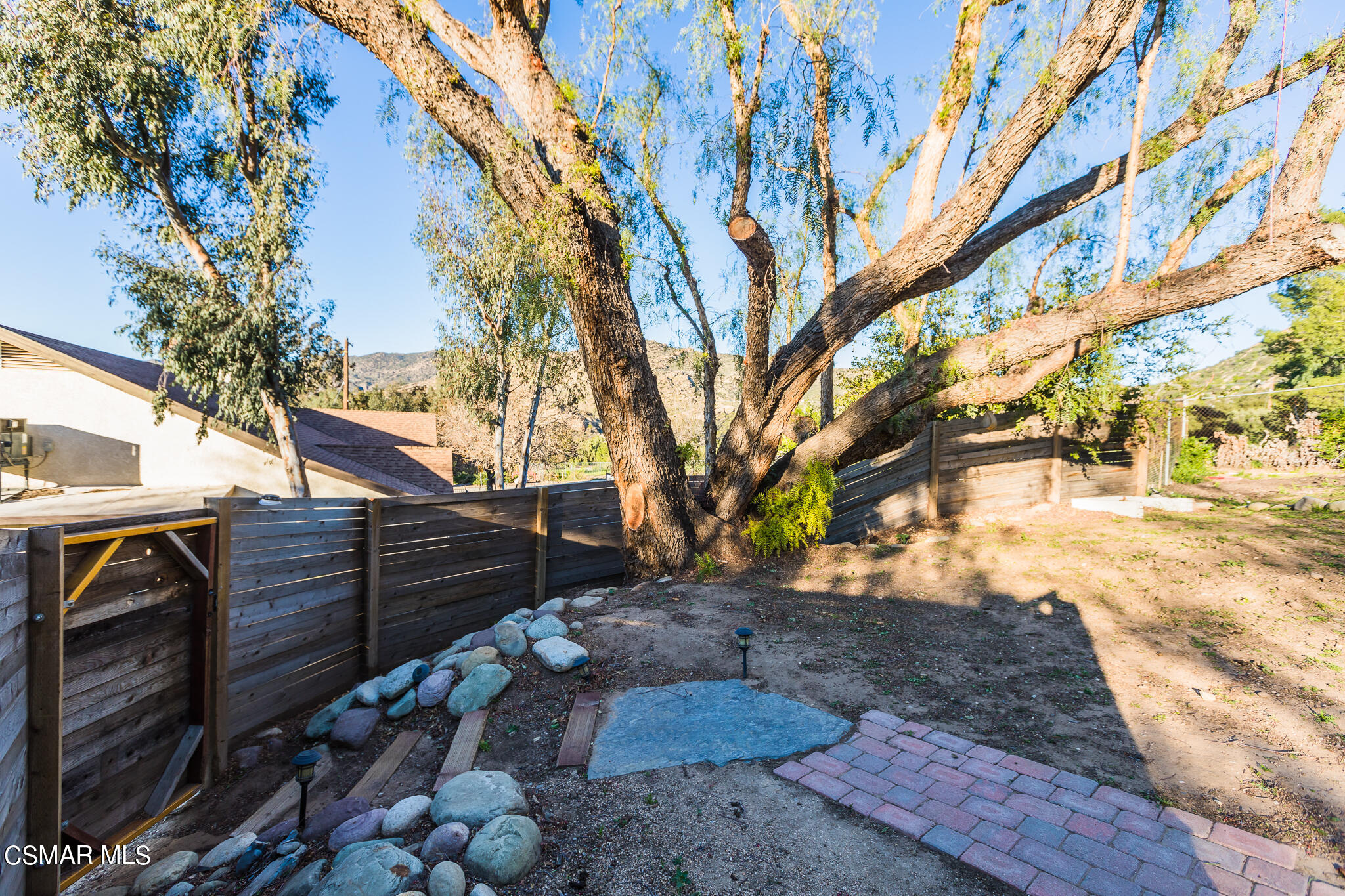 6695 Clear Springs Road Simi Valley, CA 93063 - Photo 22 of 94 a view of a backyard of the house