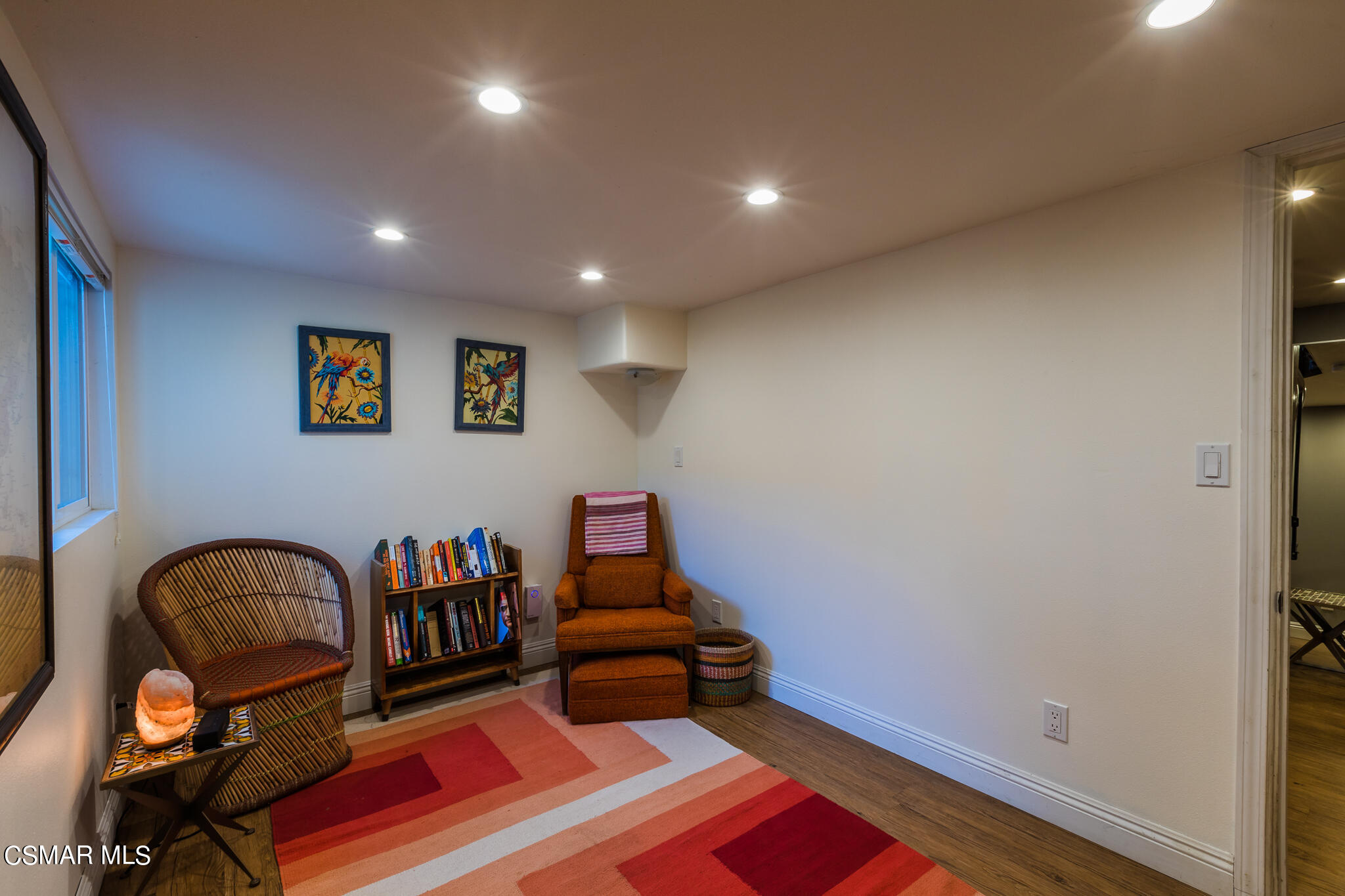 6695 Clear Springs Road Simi Valley, CA 93063 - Photo 32 of 94 a living room with furniture and wooden floor