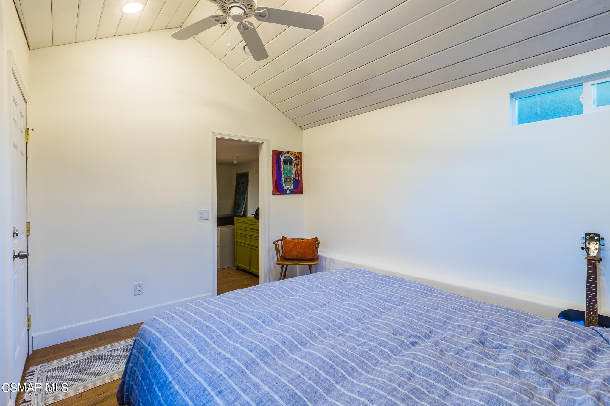 6695 Clear Springs Road Simi Valley, CA 93063 - Photo 36 of 94 a bedroom with a bed and wooden floor