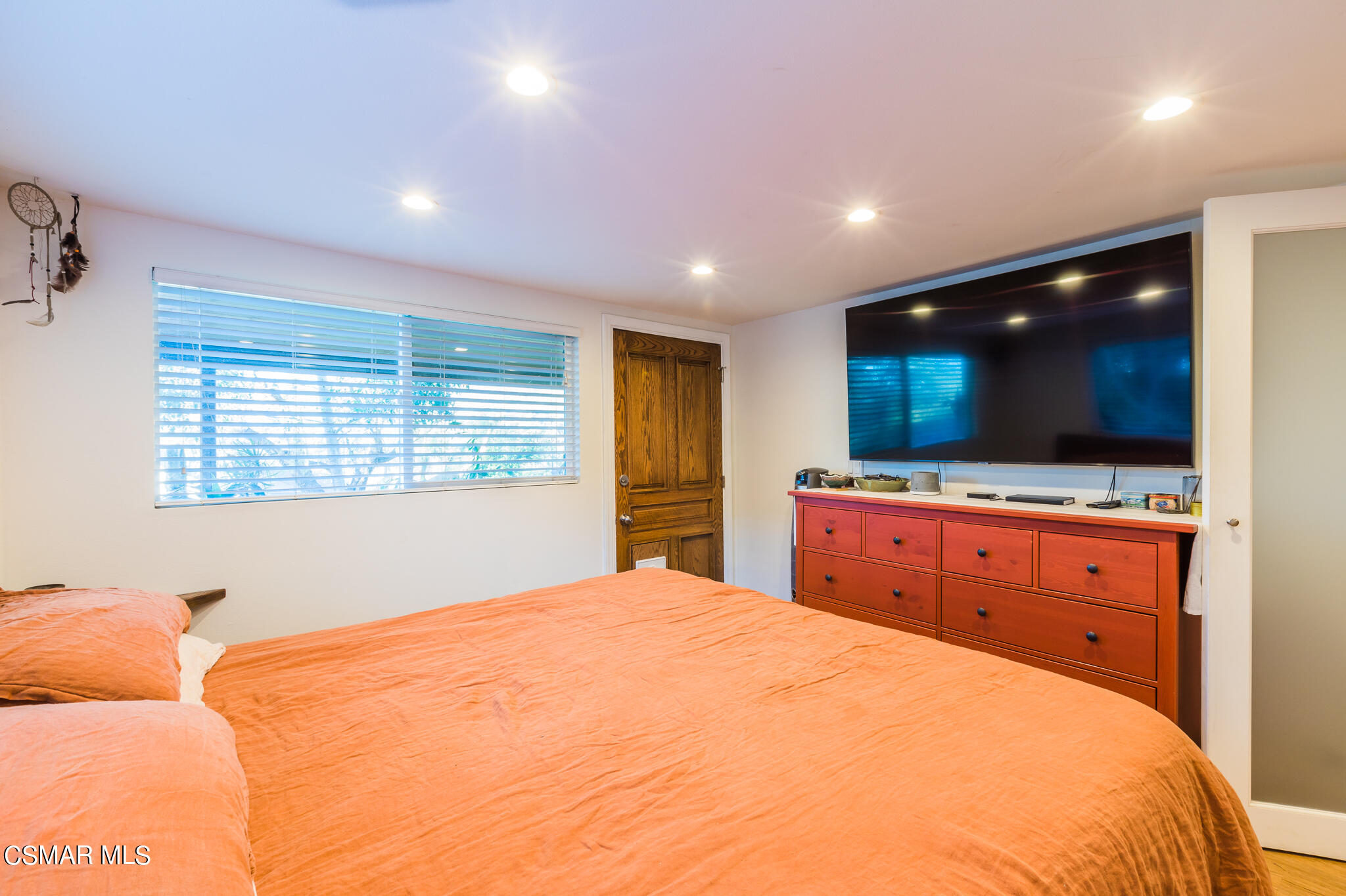 6695 Clear Springs Road Simi Valley, CA 93063 - Photo 40 of 94 a bedroom with a bed and a flat screen tv