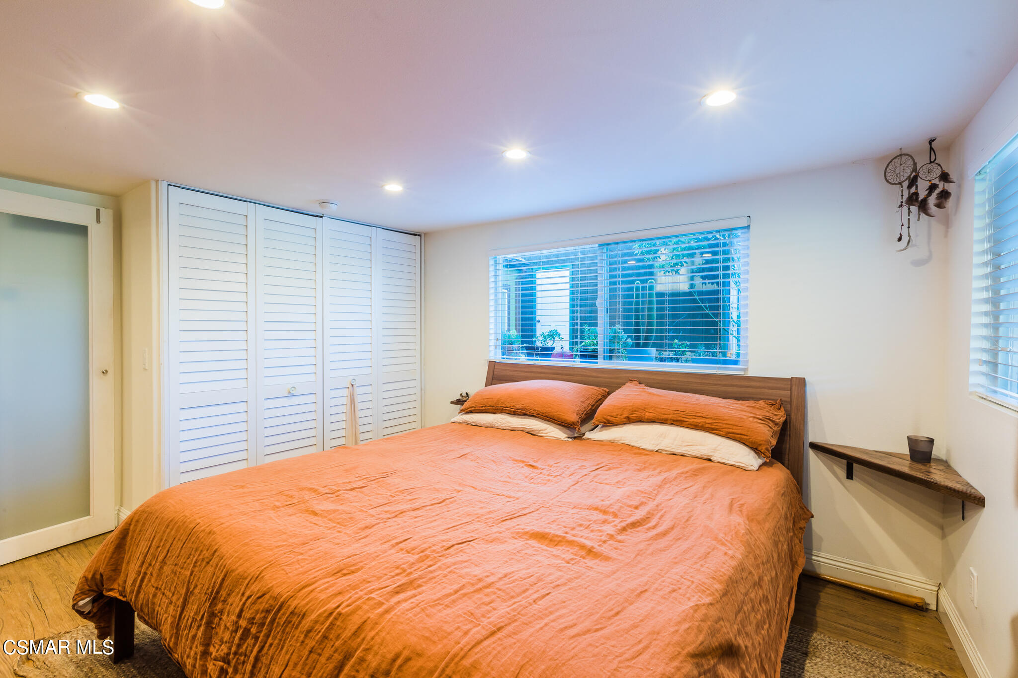 6695 Clear Springs Road Simi Valley, CA 93063 - Photo 42 of 94 a bedroom with a bed and a window