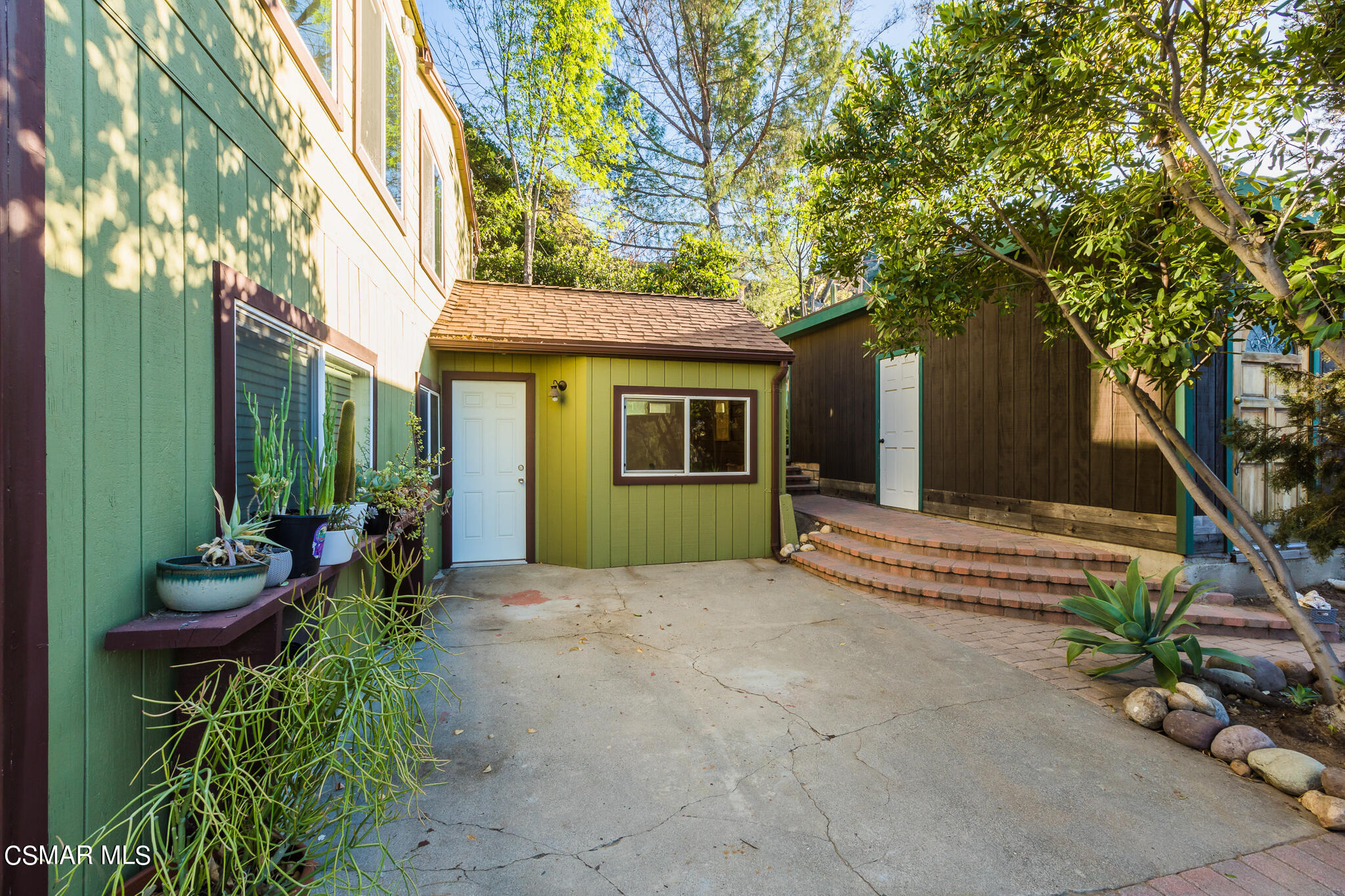 6695 Clear Springs Road Simi Valley, CA 93063 - Photo 5 of 94 a view of an house with backyard space and garden