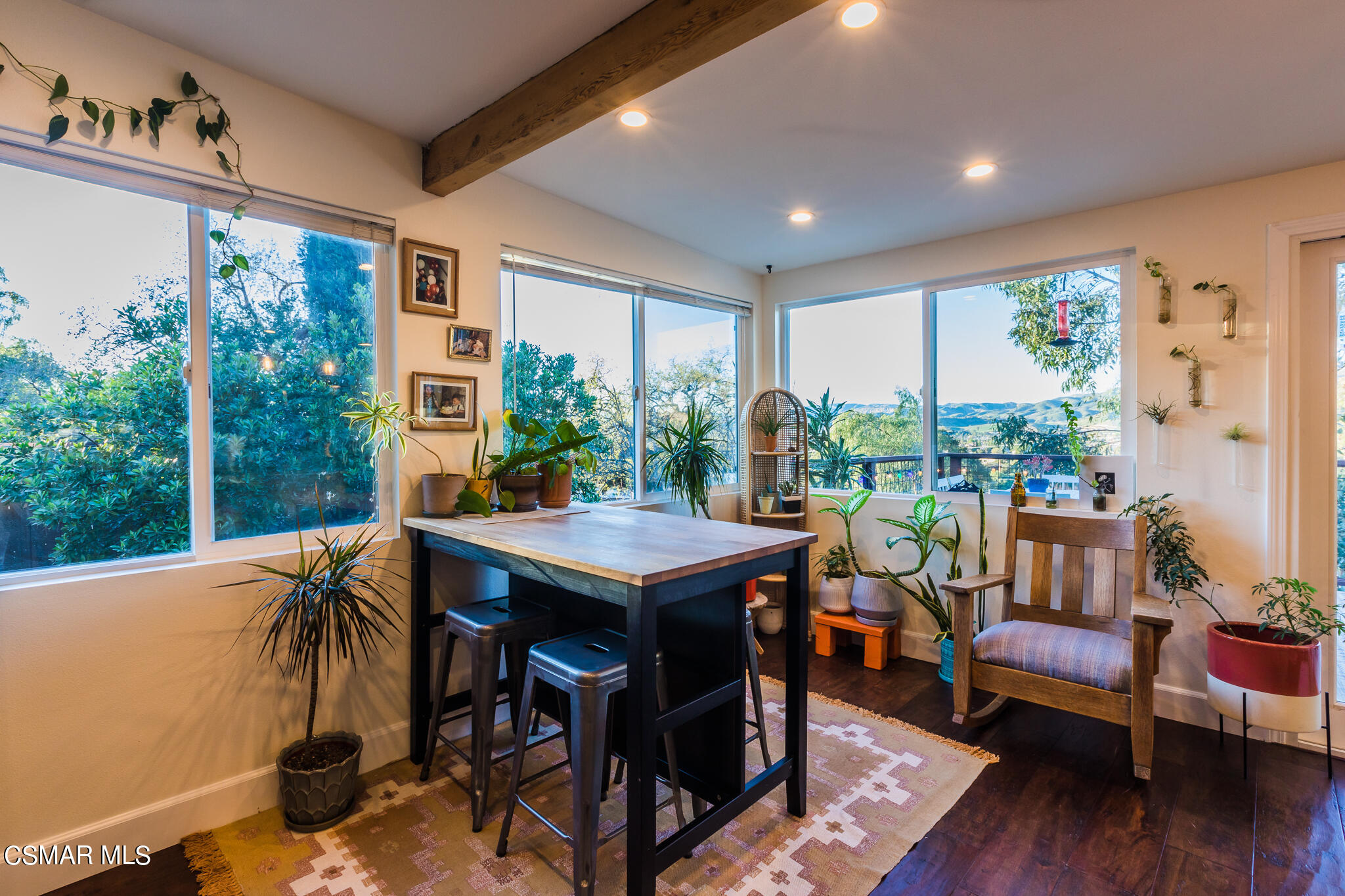 6695 Clear Springs Road Simi Valley, CA 93063 - Photo 52 of 94 a view of a dining room with furniture window and wooden floor