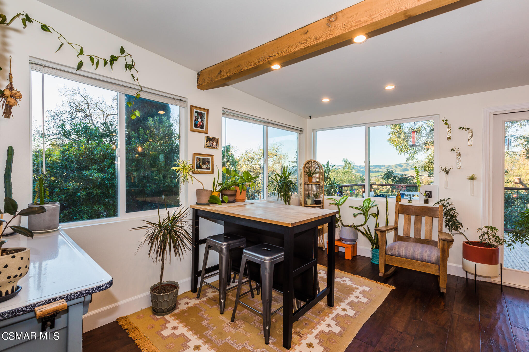 6695 Clear Springs Road Simi Valley, CA 93063 - Photo 55 of 94 a view of a dining room with furniture window and wooden floor