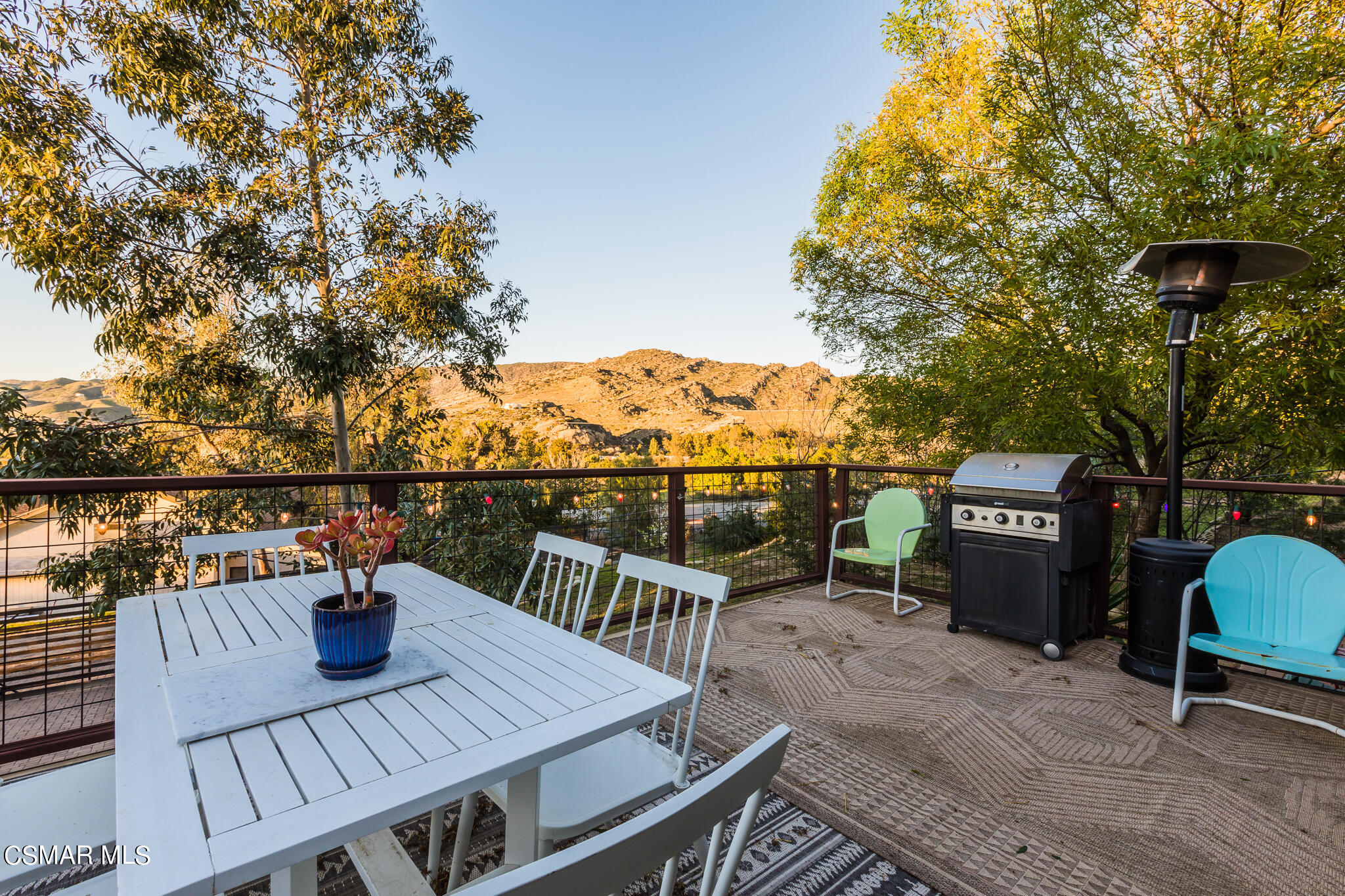 6695 Clear Springs Road Simi Valley, CA 93063 - Photo 69 of 94 a view of a balcony dining area and a table