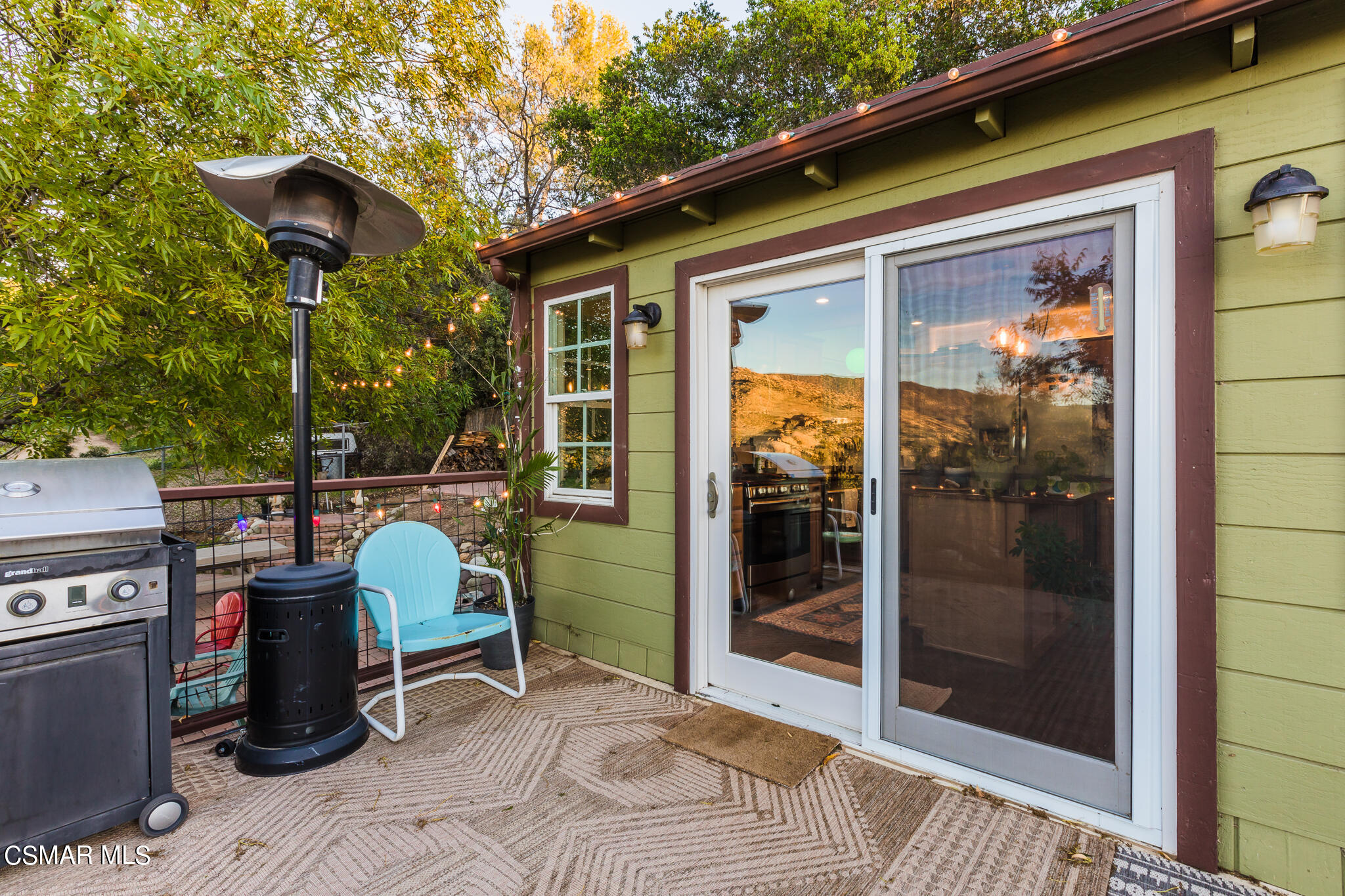 6695 Clear Springs Road Simi Valley, CA 93063 - Photo 71 of 94 a view of a porch with furniture and floor to ceiling window