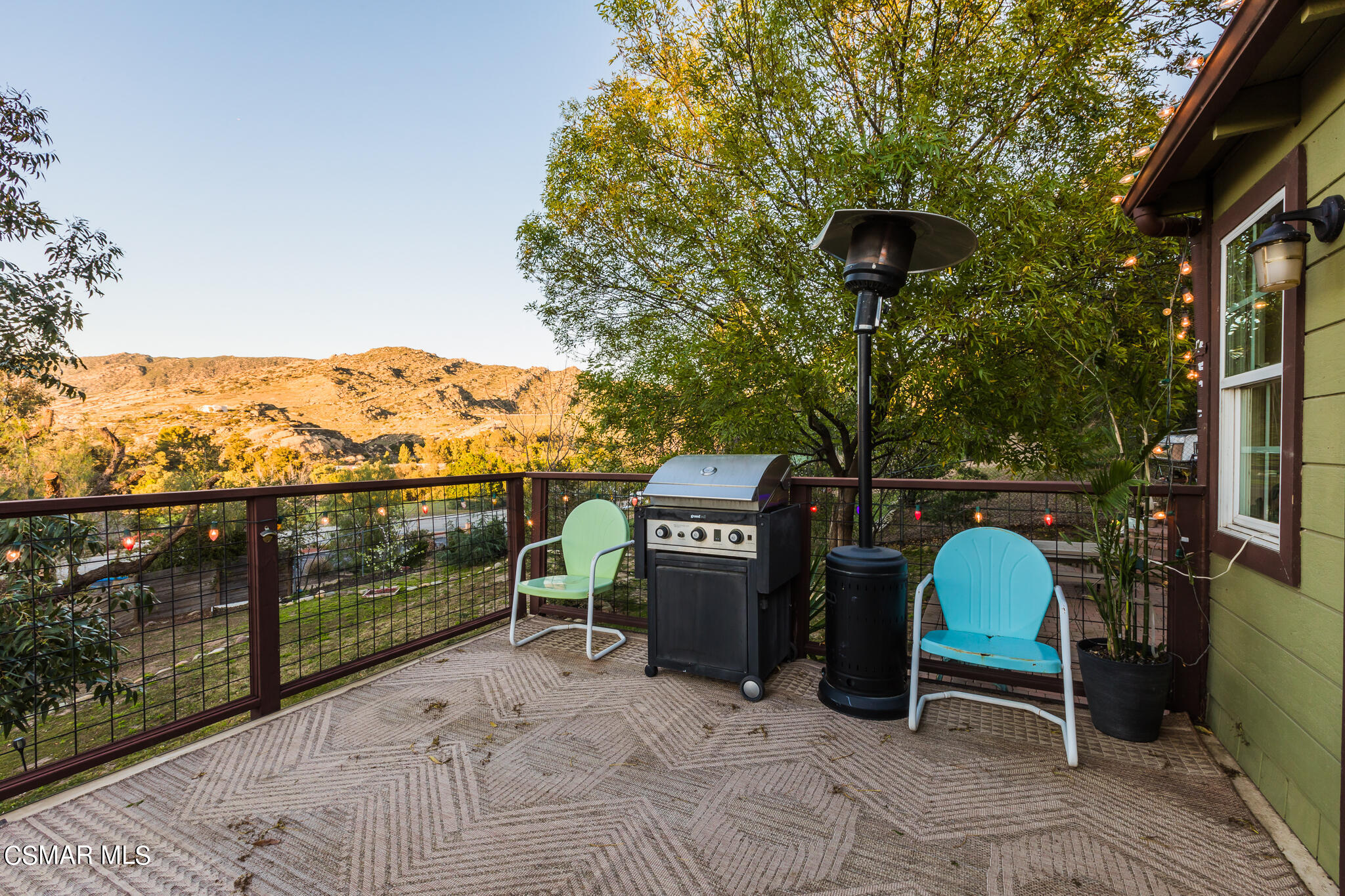 6695 Clear Springs Road Simi Valley, CA 93063 - Photo 72 of 94 a view of a terrace with furniture and a yard