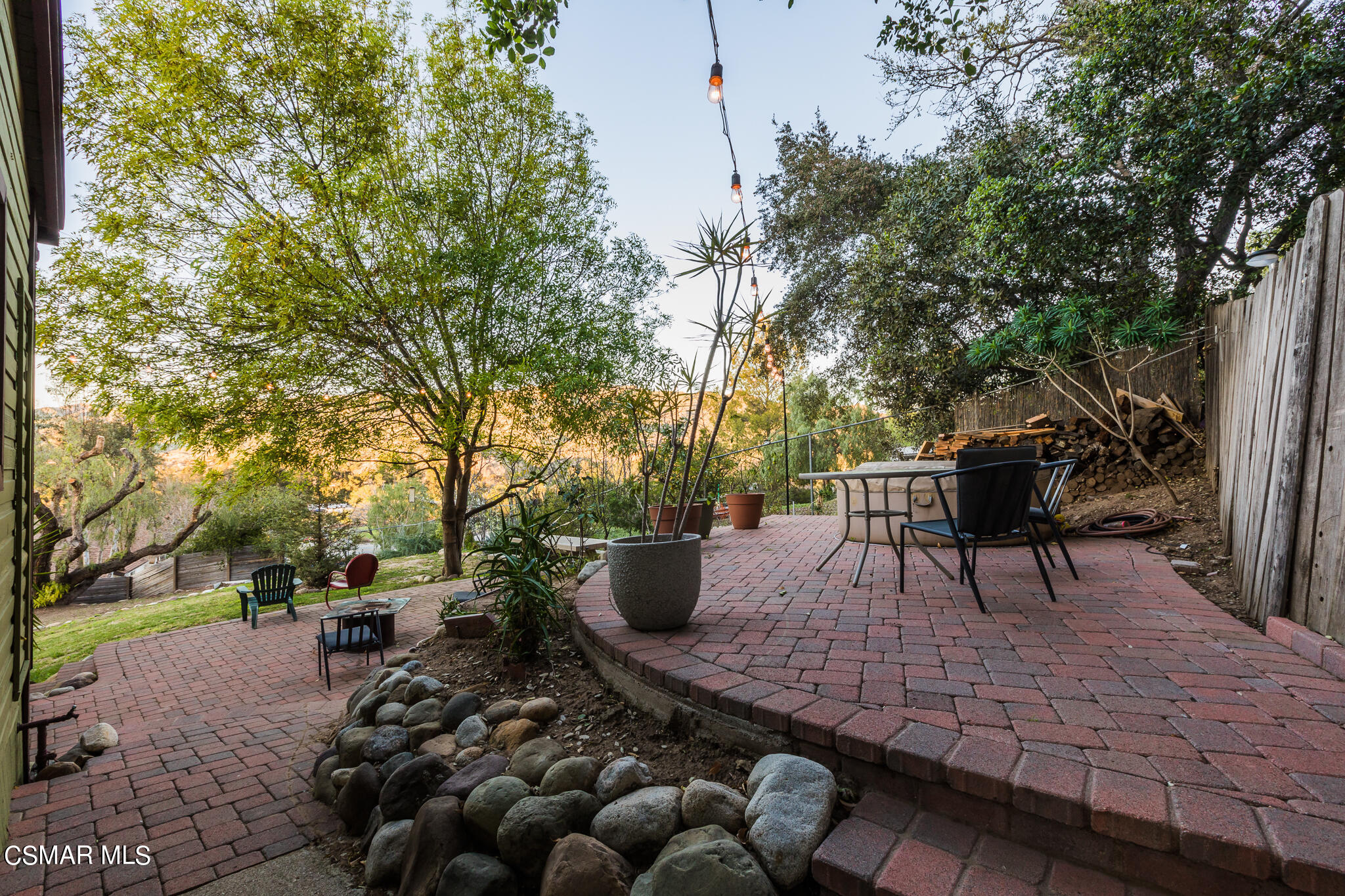 6695 Clear Springs Road Simi Valley, CA 93063 - Photo 74 of 94 a view of a tables and chairs in a patio