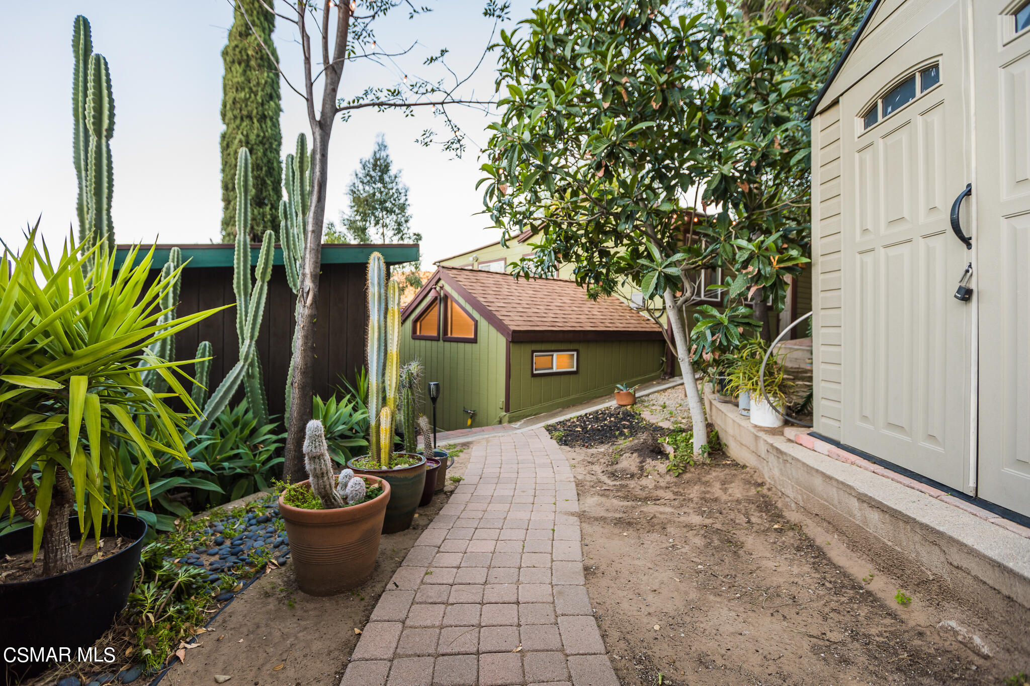 6695 Clear Springs Road Simi Valley, CA 93063 - Photo 78 of 94 a view of a house with potted plants