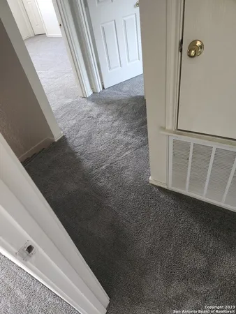 a view of balcony with wooden floor