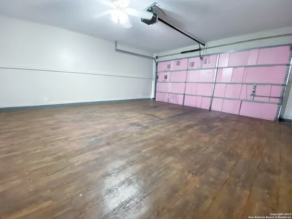 a view of a large house with a large yard