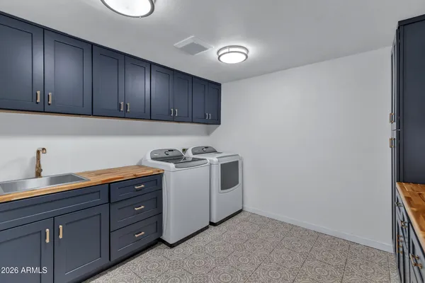 a view of cabinets with wooden floor