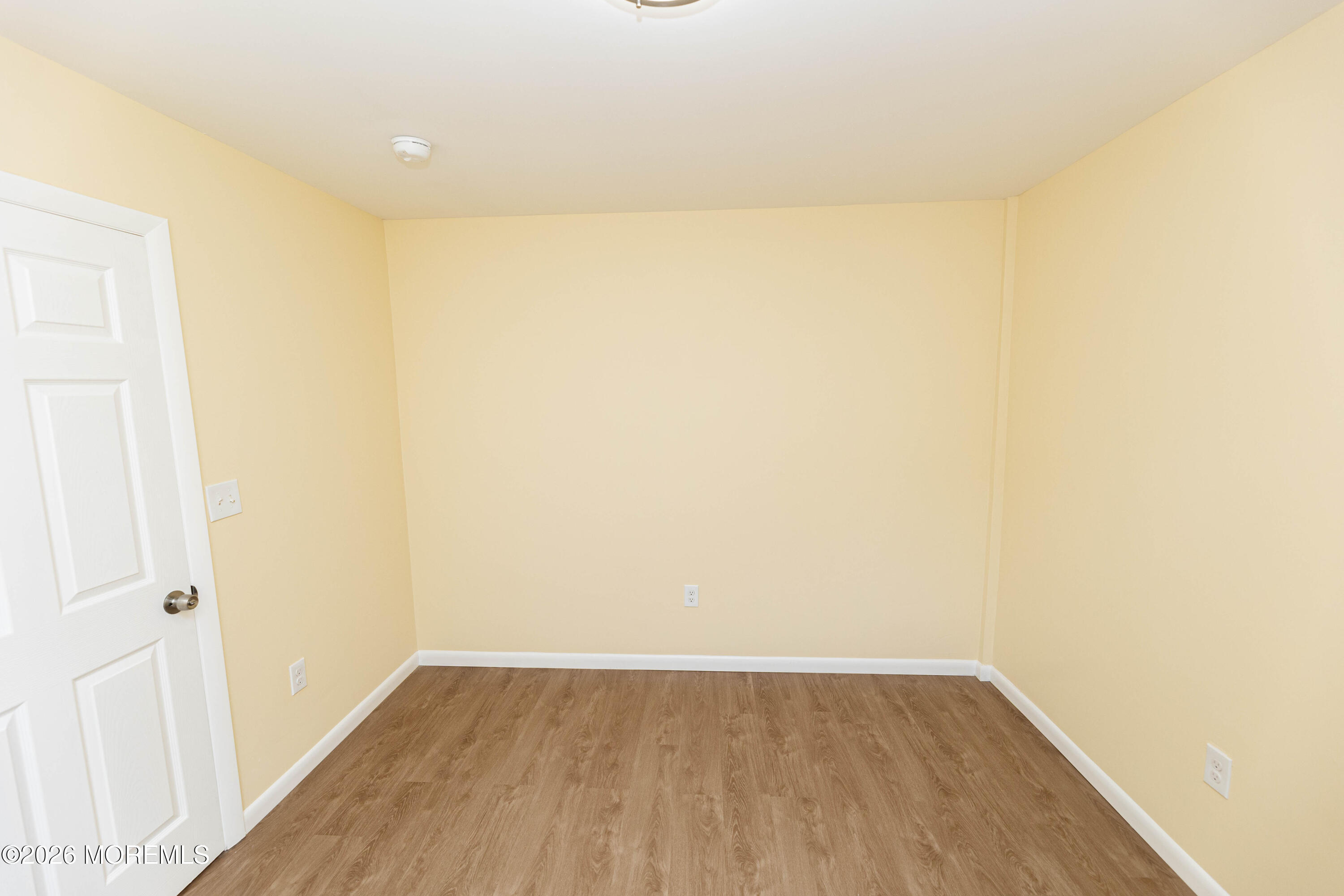 2408 Herbertsville Road Point Pleasant, NJ 08742 - Photo 52 of 82 a view of a room with wooden floor