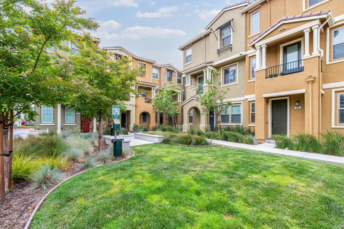 625 Cinnamon Circle Mountain View, CA 94043 - Photo 4 of 7 a view of a building with a yard