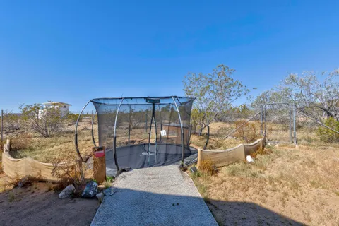 a view of a livingroom with furniture