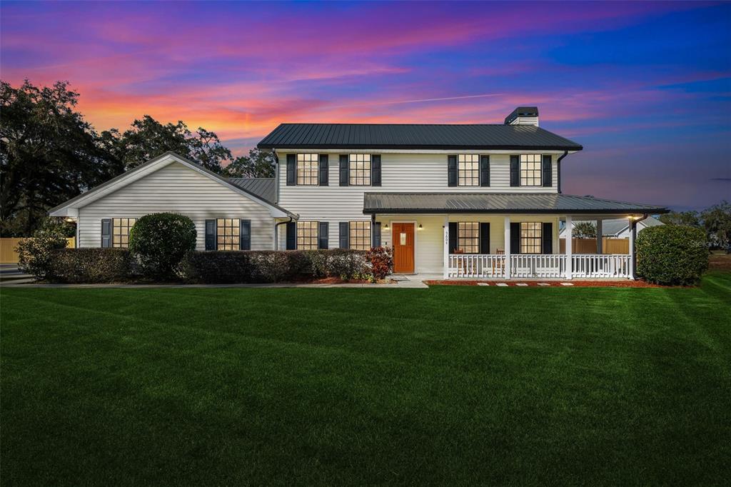 5604 Miley Road Plant City, FL 33565 - Photo 1 of 1 a front view of a house with a garden